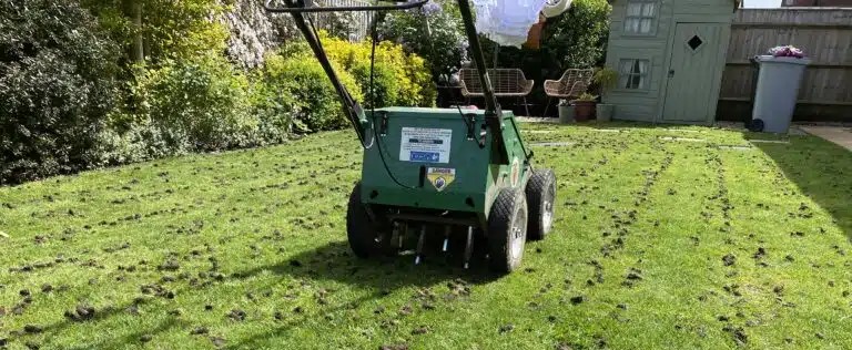 A lawn aeration machine in a garden
